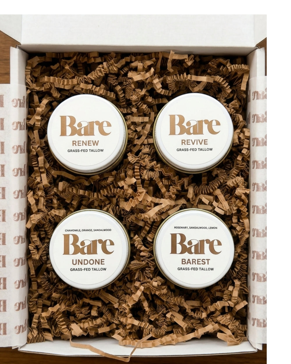 The Ritual Discovery Set: four grass-fed tallow balms (Renew, Revive, Undone, Barest) in a kraft gift box